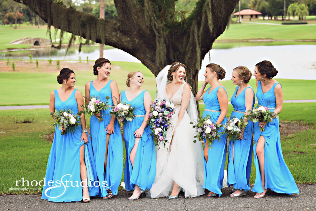 Bridesmaids in teal wedding dresses at Mission Inn