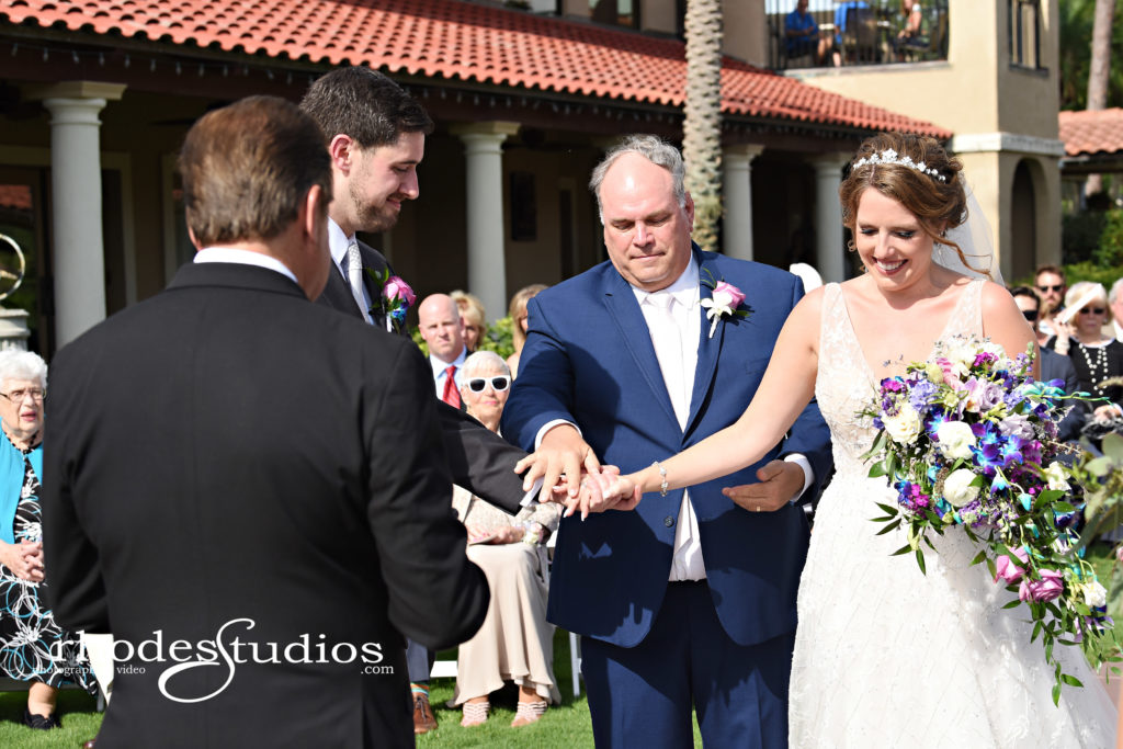 Father giving away bride at at a mission inn wedding
