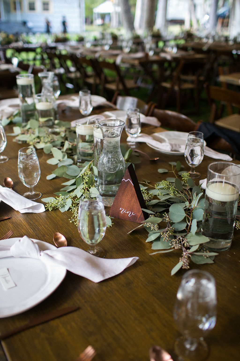 Rustic reception tablescape at at Six Mile Estate, a Montana wedding venue