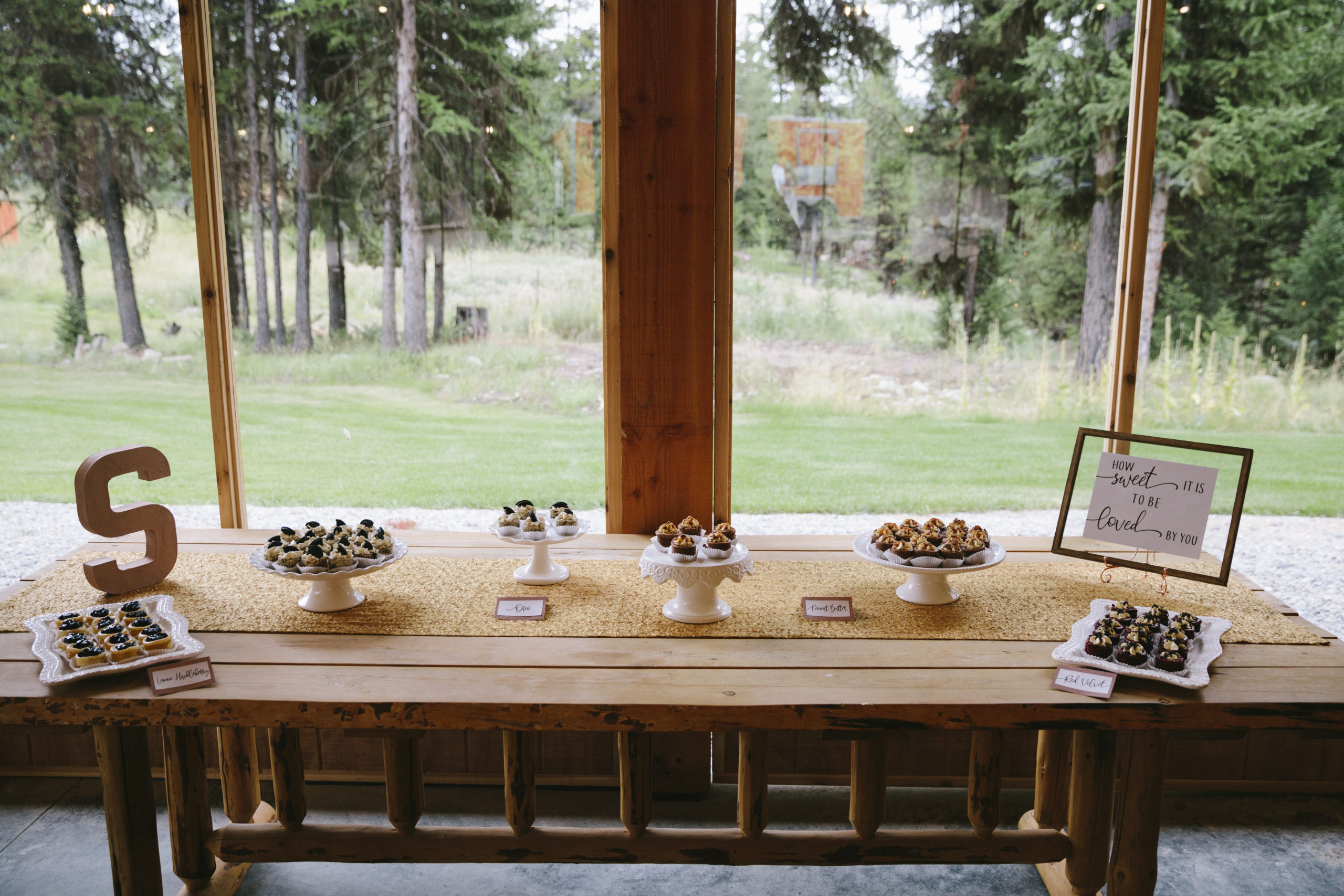 Dessert table at ranch wedding reception
