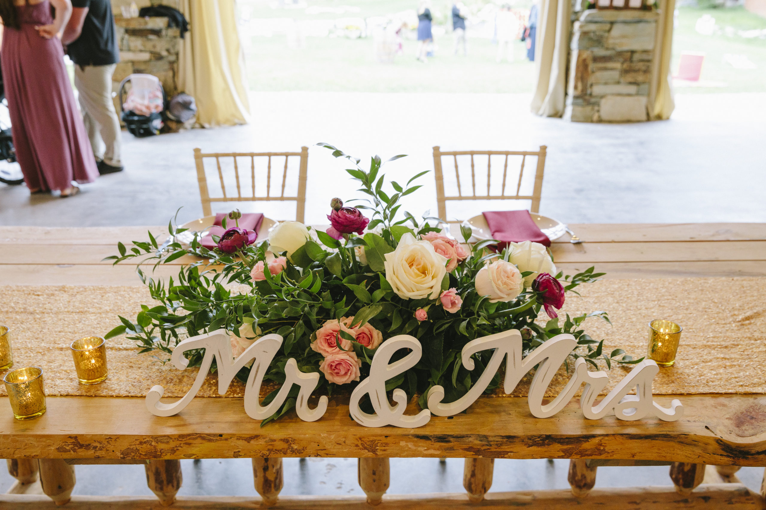 Sweetheart table at a ranch wedding reception